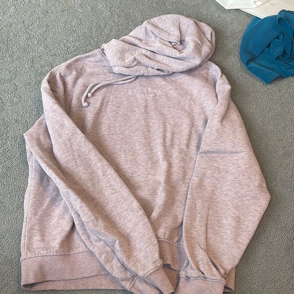 Purple hoodie with writing